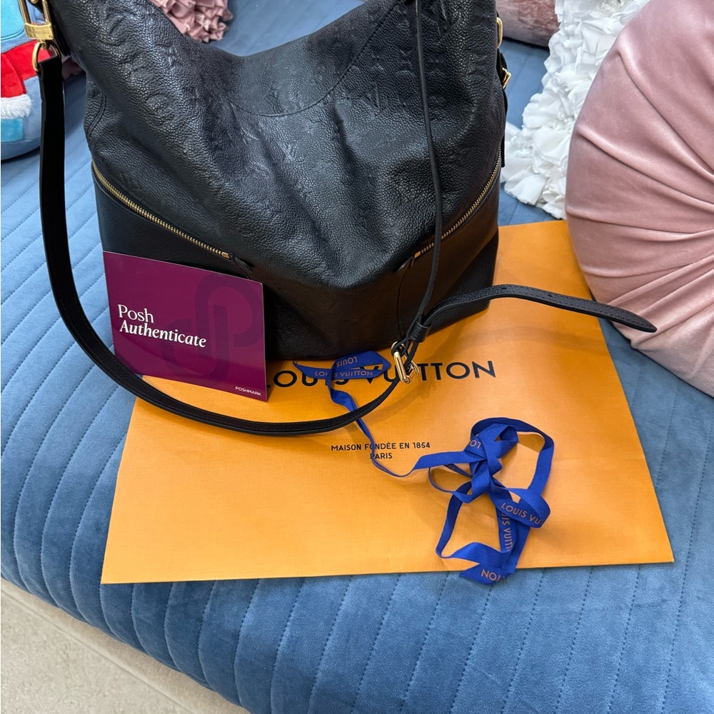 Authentic Louis Vuitton Empreinte Melie black embossed leather hobo bag